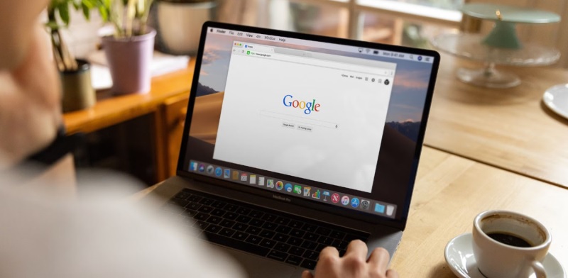 Customer watching Google on a laptop.